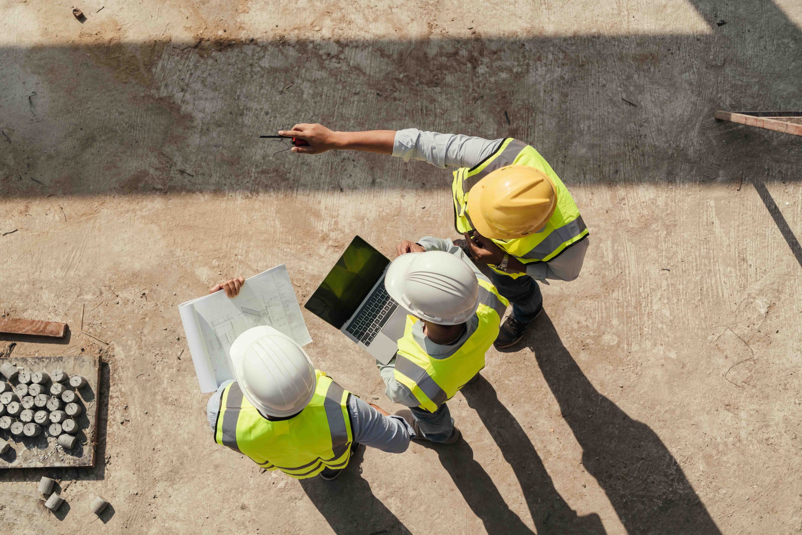 Top view of workers in hard hats